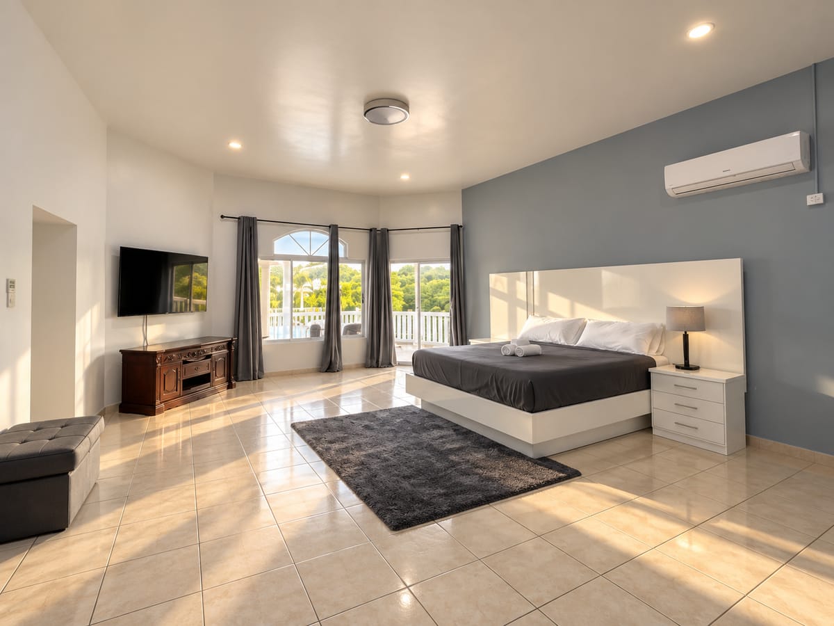 Cap Estate villa master bedroom with TV and private balcony, Paris Villas